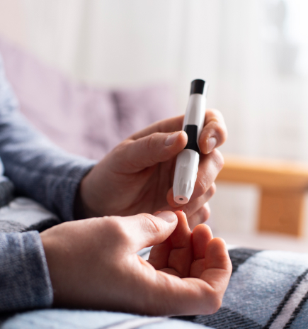 Patient checking blood glucose levels